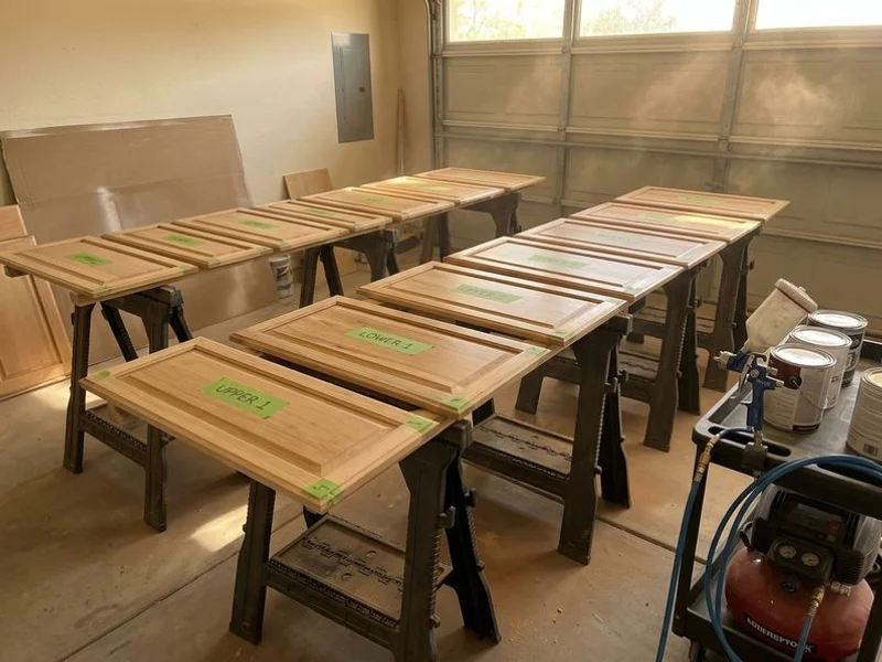 Labeled cabinet doors in spray setup